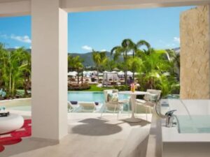 Private airport transfer arrival at Breathless Montego Bay Resort terrace view.