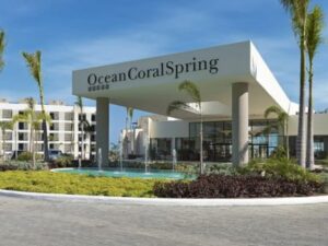 Grand entrance of Ocean Coral Spring Resort Falmouth for private airport transfers.