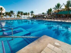 Large outdoor pool and sun deck at Hotel Riu Ocho Rios Jamaica.