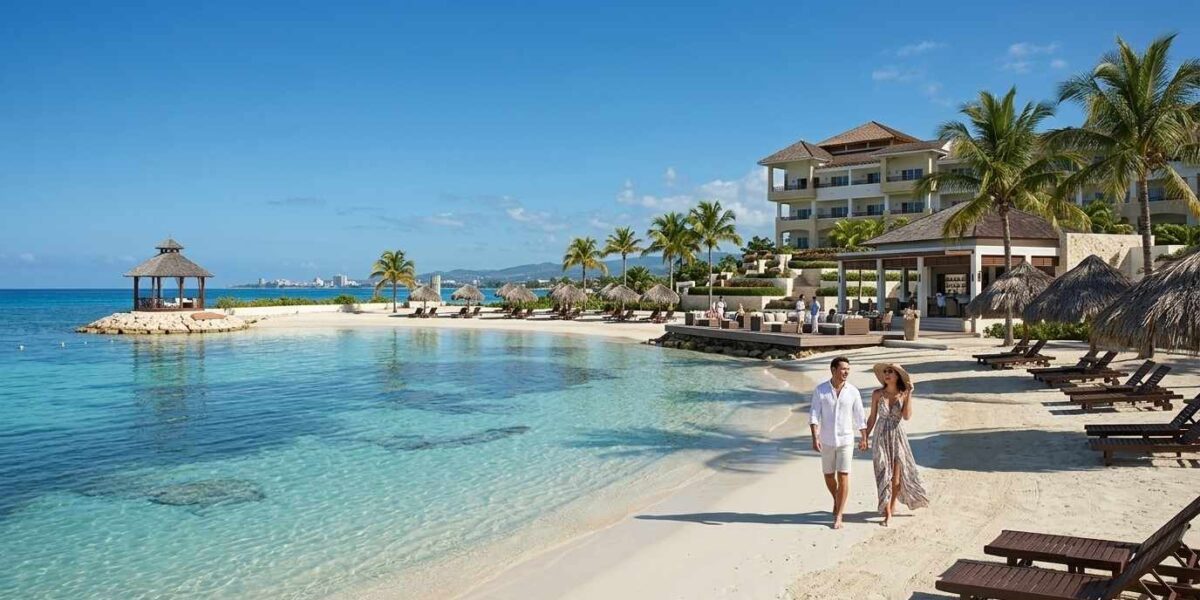 Secrets Wild Orchid Montego Bay private beach with white sand and turquoise Caribbean Sea.